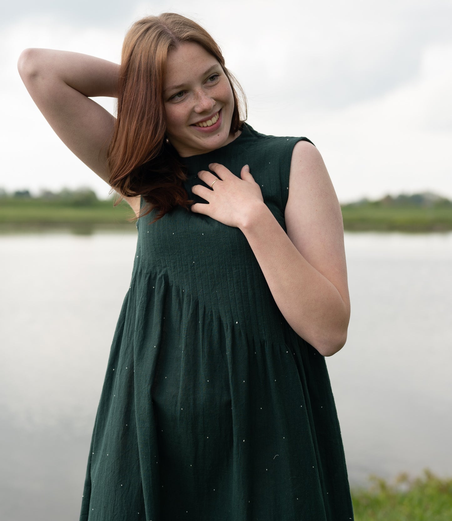 Dark green sleeveless cotton dress