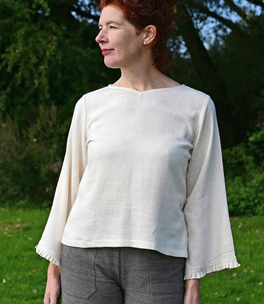 Ivory white cotton top with bell sleeves